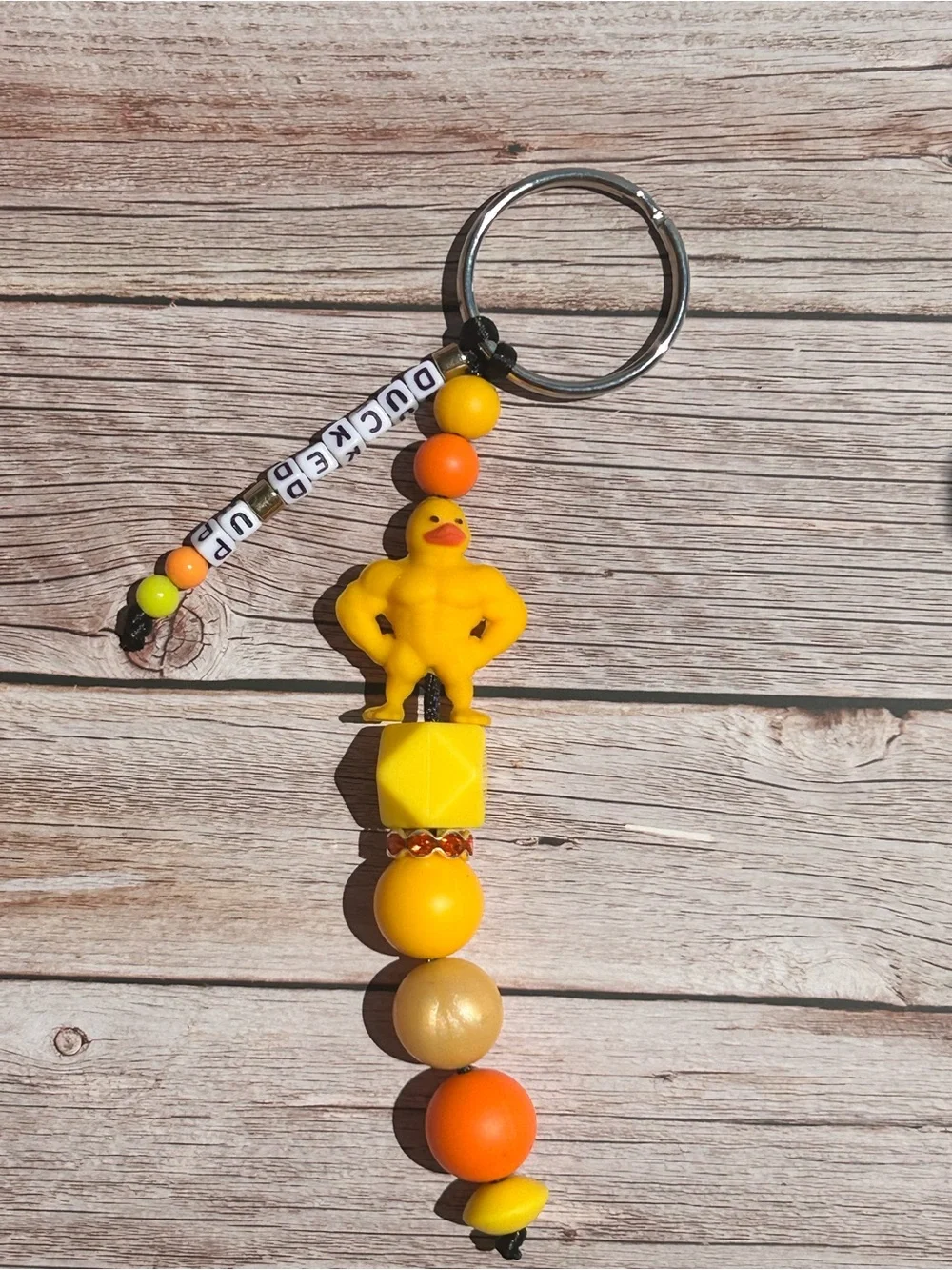 Yellow Muscular Rubber Duck Keychain with handmade letter bead strand